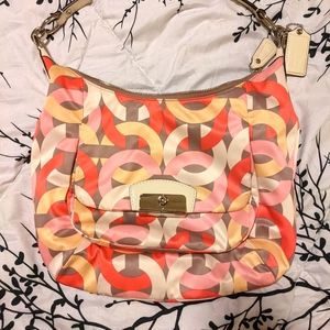 Multi Colored Coach Purse.